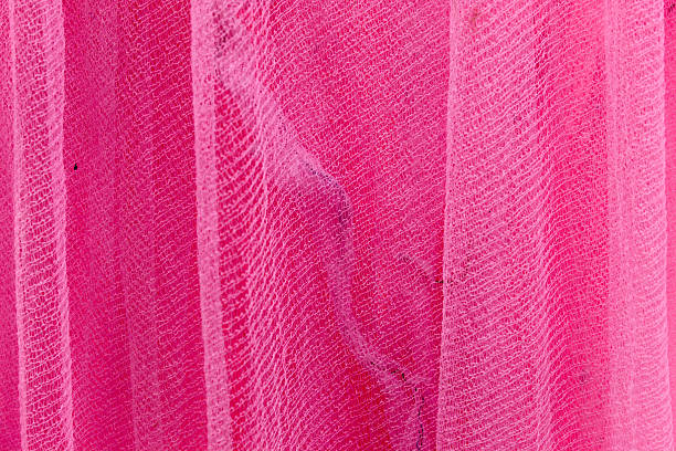 istock bright pink tulle fabric texture with soft folds and a fine net pattern 2247735211