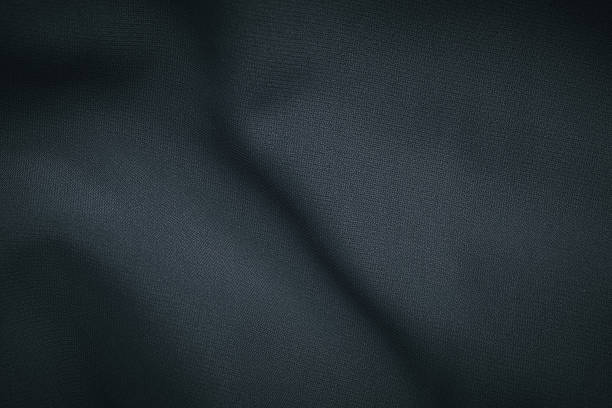 istock dark colored fabric texture with fine folds and a soft surface 2247735571