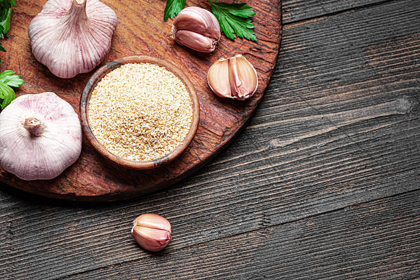 istock Garlic Powder and garlic cloves 2247736216