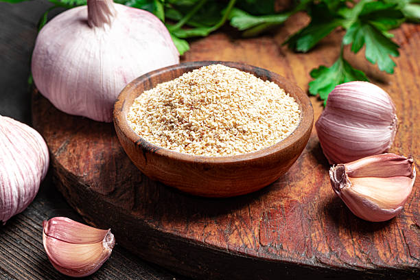 istock Garlic Powder and garlic cloves 2247736416