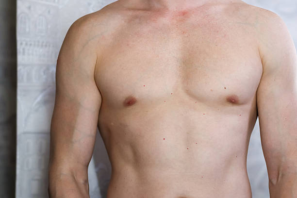 istock Muscular male torso close-up in mirror selfie 2247736456