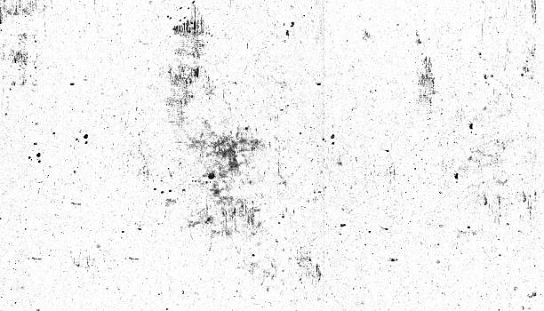 istock Grunge texture with black speckles and scratches on white background, creating distressed and vintage effect 2247736800