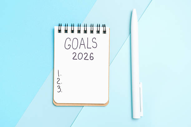 istock The inscription goals 2026 on notepad on blue background, top view. 2247737956