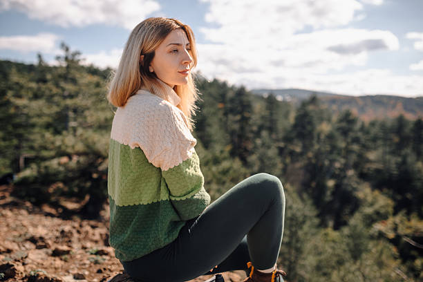 istock Woman enjoying nature during an autumn forest hike 2247739633