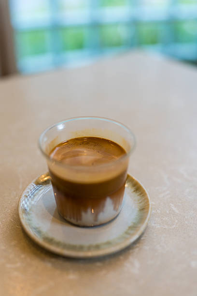 istock Dirty coffee, layered drink with a distinct robust espresso layer on the top and cold milk at the bottom. 2247742551