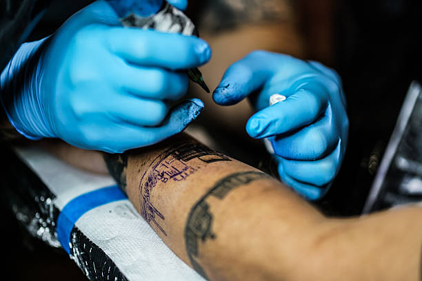 istock Making tattoo in the tattoo studio. 2247746806