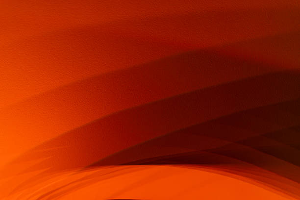 Orange curved layers forming smooth overlapping arcs with soft shadows and gradual tonal transitions in a close abstract composition