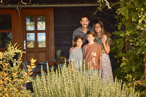 istock Happy family enjoying a day on a patio. 2247751151