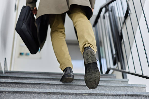 istock Moving up the stairs! 2247753275