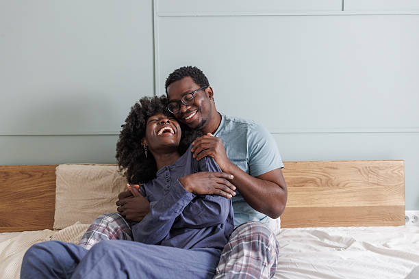istock Young African American couple sharing an affectionate moment in bedroom 2247754014