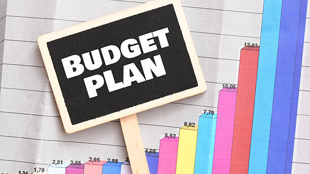 istock Budget planing concept. Top view of blackboard with word budget plan. 2247754323