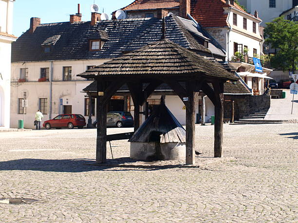Historic well in the market square in Kazimierz Dolny, Poland