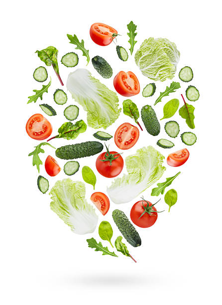 istock Fresh vegetables background. Summer salad ingredients - tomatoes, cucumbers, leafy greens, chinese cabbage flying as flow, isolated. Perfect for organic food advertising, detox menu, fitness diet. 2247757729