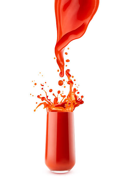 istock Fresh red tomato juice pouring juice into glass with dynamic splashes, flying drops, isolated. Healthy organic drink for design of detox diet menu, fitness cuisine or restaurant, card,  poster, flyer. 2247758099