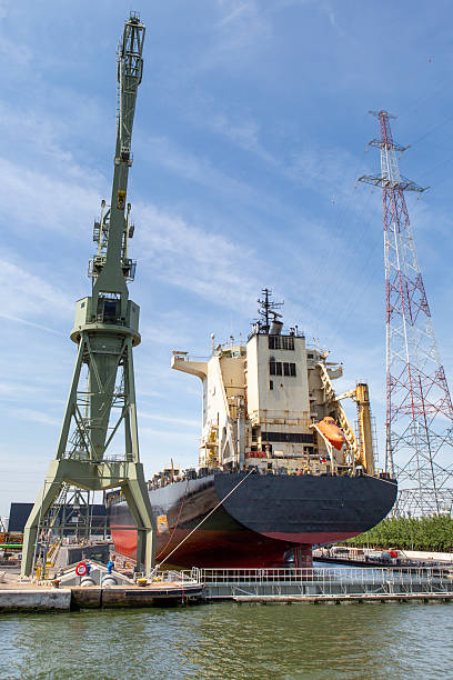istock Port of Antwerp, shipyard and large cranes 2247758449