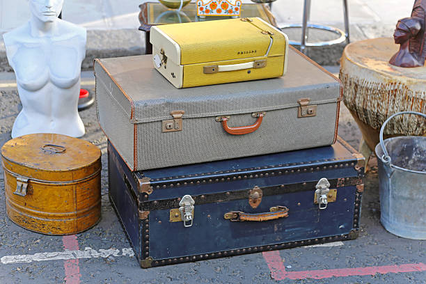 London, United Kingdom - November 22, 2013: Stack of Retro Luggage Vintage Suitcases Trunk Case at Antique Market in Portobello Road.