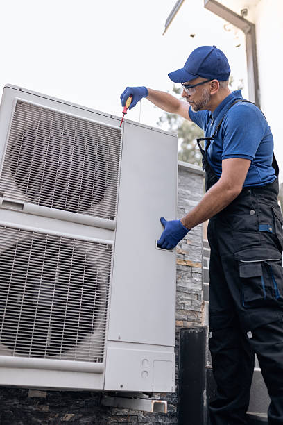 istock Repairman fixing AC outdoor unit. 2247764721