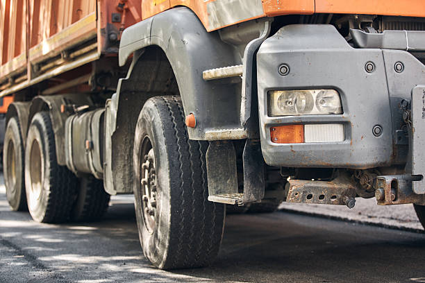 istock Public city street reconstruction with heavy machines. 2247764752
