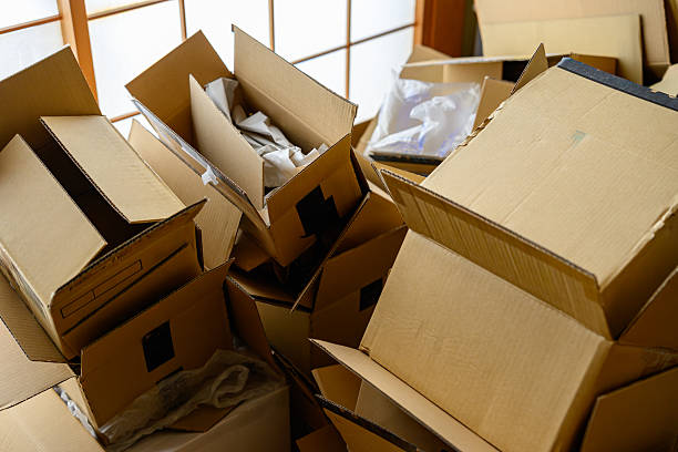 istock Pile of Empty Cardboard Boxes After Unpacking or Delivery 2247765821