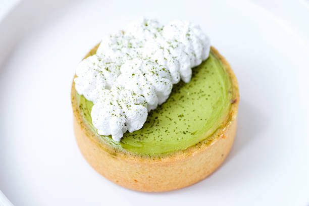 Matcha cheese tart on a white plate
