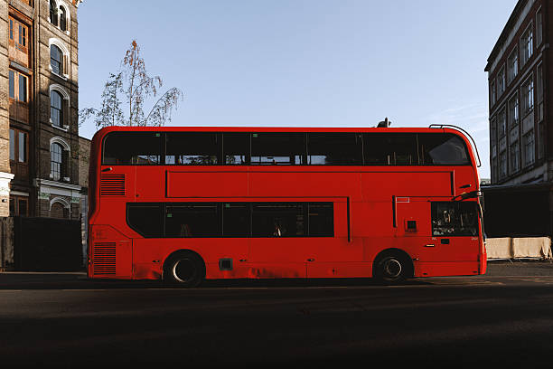istock Red London Double Decker Bus in Morning Light 2247777628