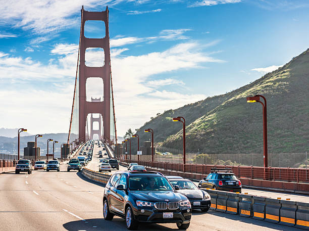 San Francisco, California - Busy daytime traffic crossing the Golden Gate Bridge on Interstate 101.