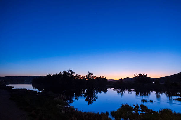 Dusk on the Guadiana River, flowing next to the village of Medellin in the Extremadura