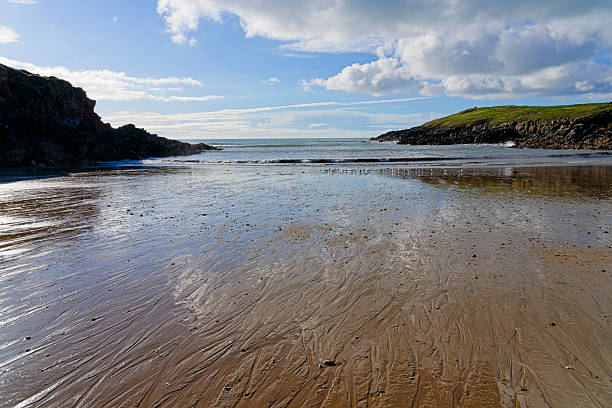 An autumn morning at Porth Trecastell or Cable Bay near Rhosneigr on the island of Anglesey, Wales.