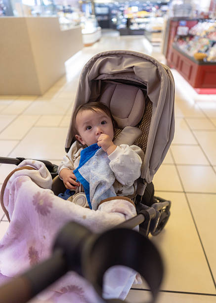 Baby in stroller while the mother is shopping
