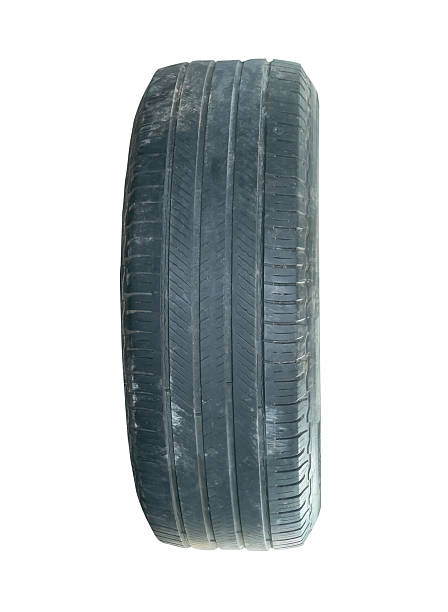 istock One old black truck tire isolated on white background with clipping path 2247783216