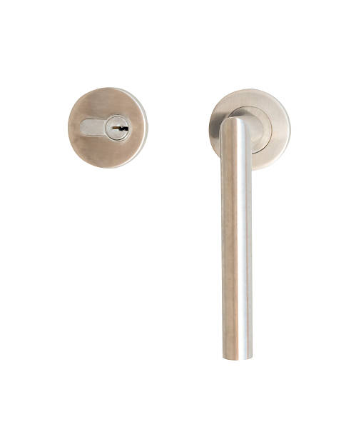 istock One silver door grip or handle with separated keyhole isolated on white background with clipping path 2247783450