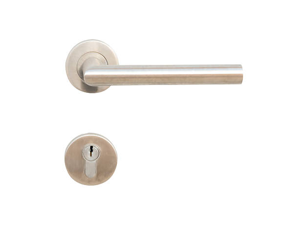 istock One silver door grip or handle with separated keyhole isolated on white background with clipping path 2247783468