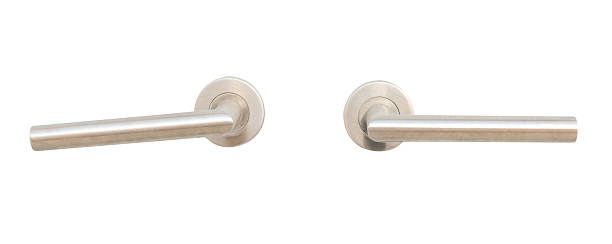 istock Two silver door grips or handles isolated on white background with clipping path 2247783533