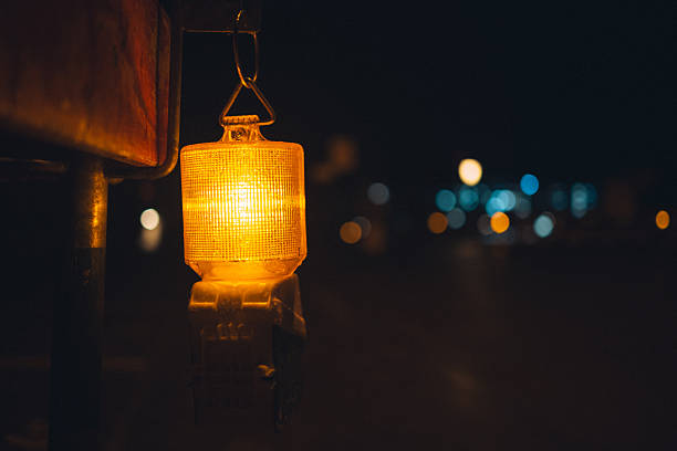 istock Construction site road safety warning light at night. Wide angle, close up shot, shallow depth of field, no people 2247783815