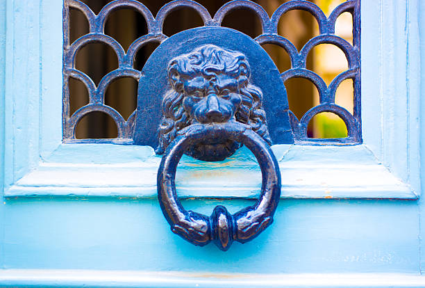 Paris, France: Ornate Antique Lion Door Knocker Close-Up