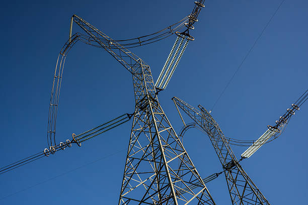 istock High-voltage power line towers with geometric steel structures 2247788990