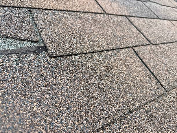 istock Close-up of a newly installed shingled roof 2247790588