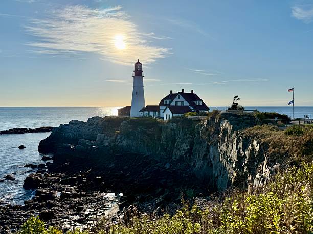 istock Portland Head Light in late afternoon surrounded by with dramatic waves and cliffs 2247791414