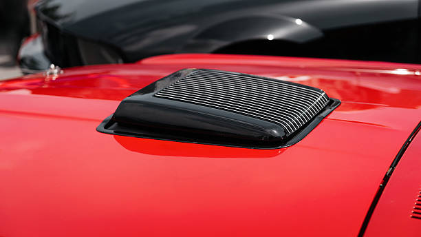 istock Red 1960s car with hood scoop. 2247795236