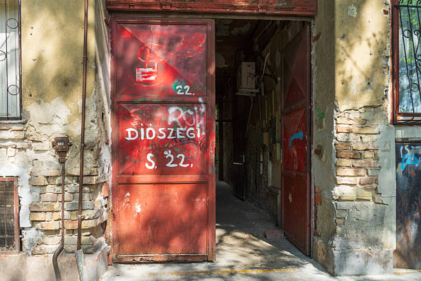 Entrance of a worn housing block in Budapest slated for demolition for the new campus of the National University of Public Service.