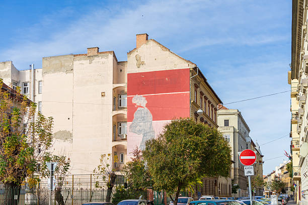 The walls of old apartment buildings in Budapest’s 7th district.