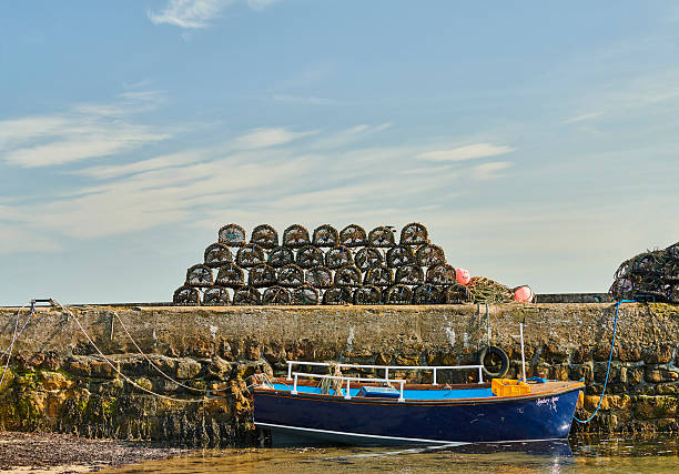 Fishing boat tied up at Beadnell Bay