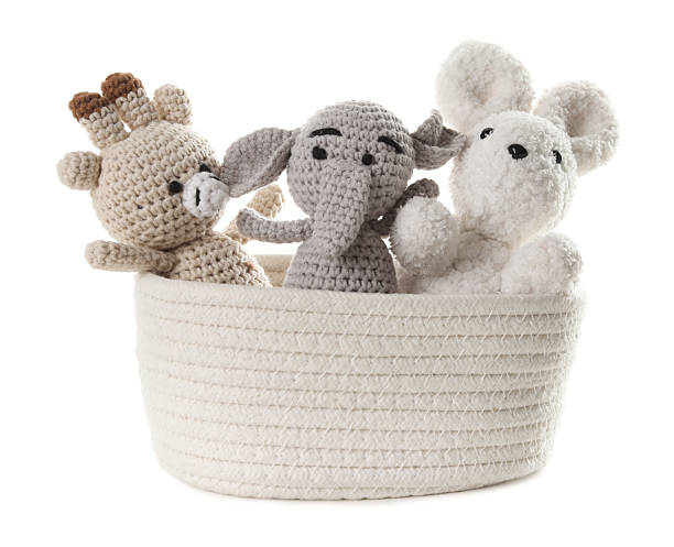 istock Different soft toys in wicker basket isolated on white 2247798253