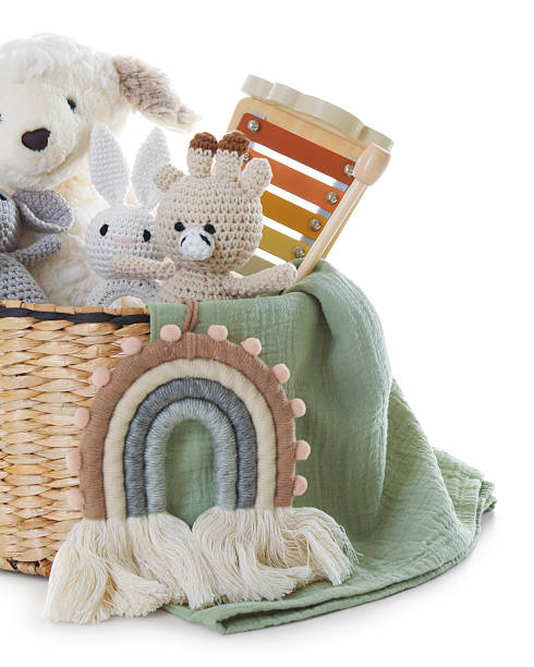 istock Different toys in wicker basket isolated on white 2247798271
