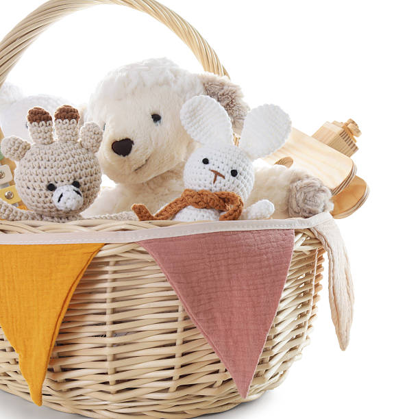 istock Different toys in wicker basket isolated on white 2247798287