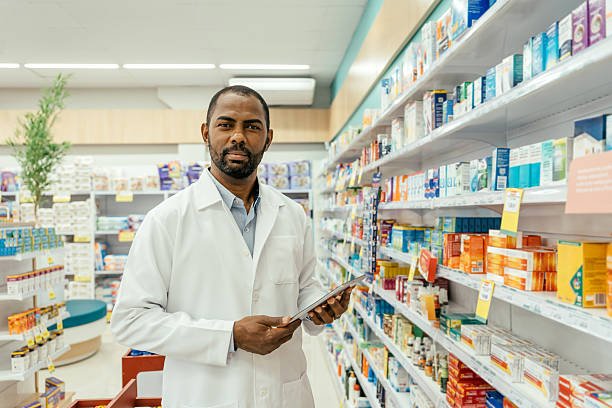istock Portrait of a pharmacist checking medications on a pharmacy shelf. 2247798813