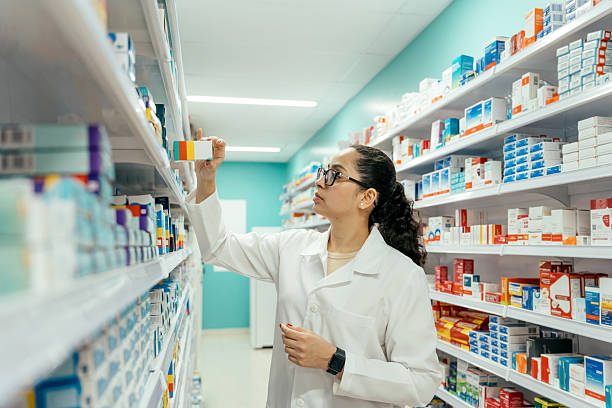 istock Pharmacist checking medicines on the pharmacy shelf. 2247798885