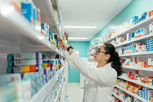 istock Pharmacist checking medicines on the pharmacy shelf. 2247798887