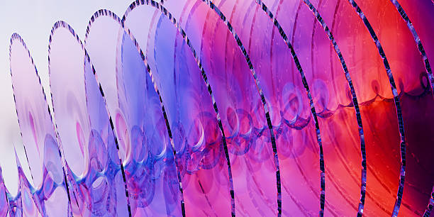 Abstract colorful spiral pattern with vibrant purple and red hues. 3d rendering