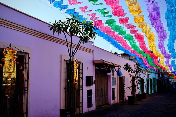 istock Purple Storefront On Cobblestone Street with Papel Picado (Oaxaca de Juarez, Mexico) 2247800893